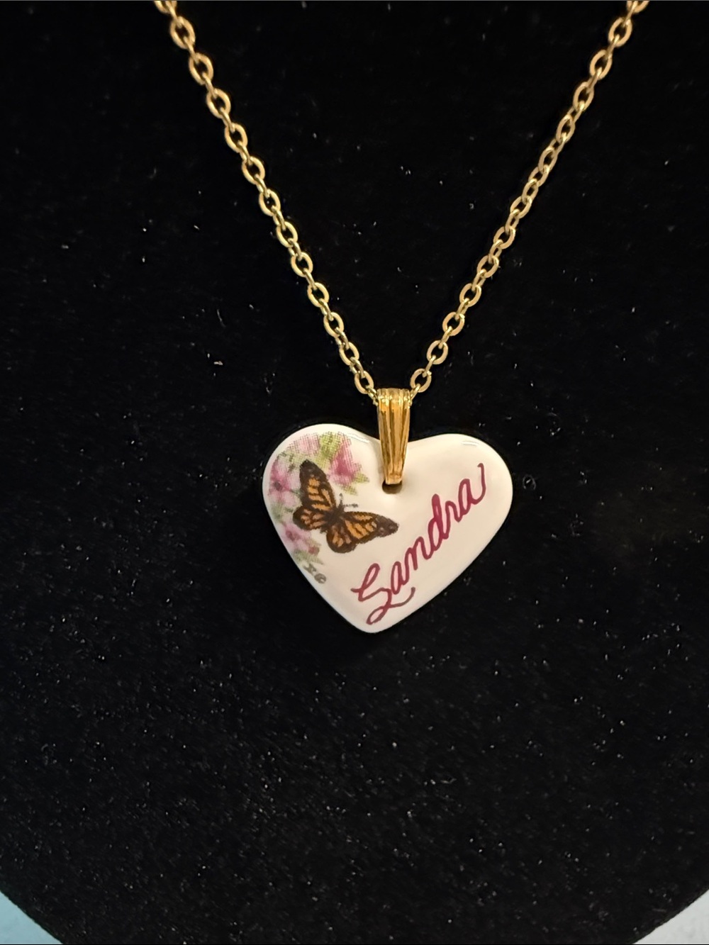 Source Unknown Gold-Tone Chain with White Heart Pendant and Butterfly Detail